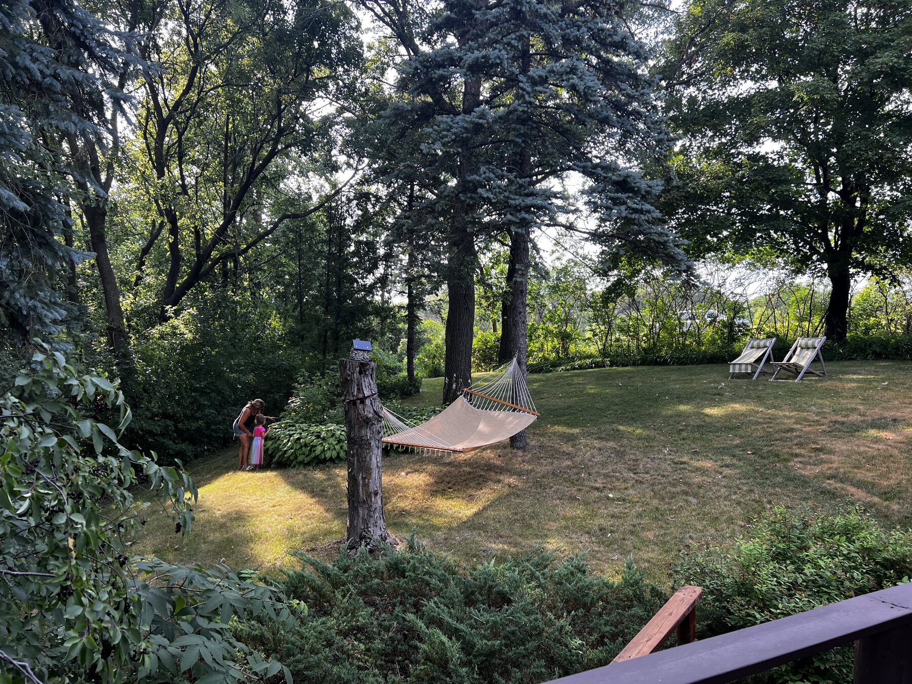 Hammock and lawn chairs on the hillside